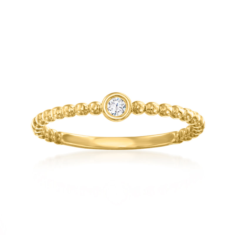 Gold beaded ring with bezel-set round diamond center