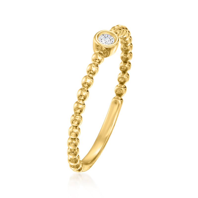 Gold beaded bezel-set diamond ring, angled view