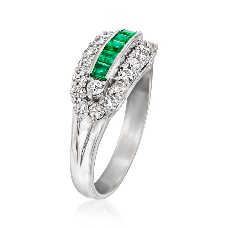 Platinum emerald-and-diamond ring with raised rectangular green emerald and halo