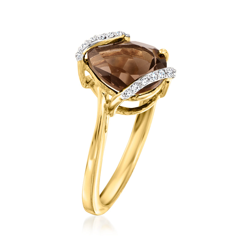 Gold ring with faceted smoky quartz center, diamond halo, and side bar accents