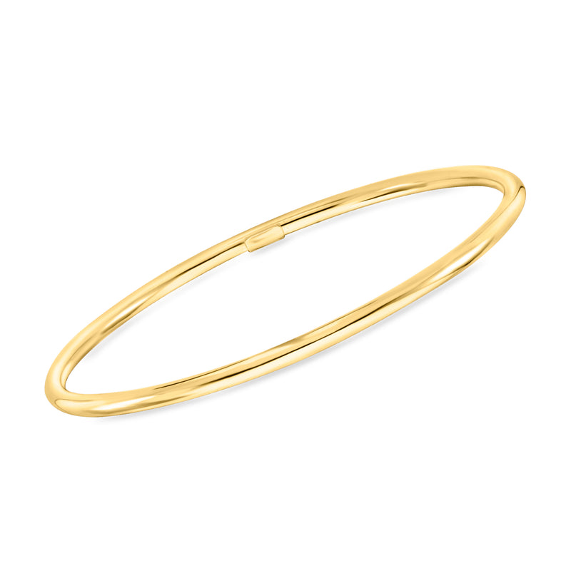 Polished gold over silver bangle bracelet, smooth oval design