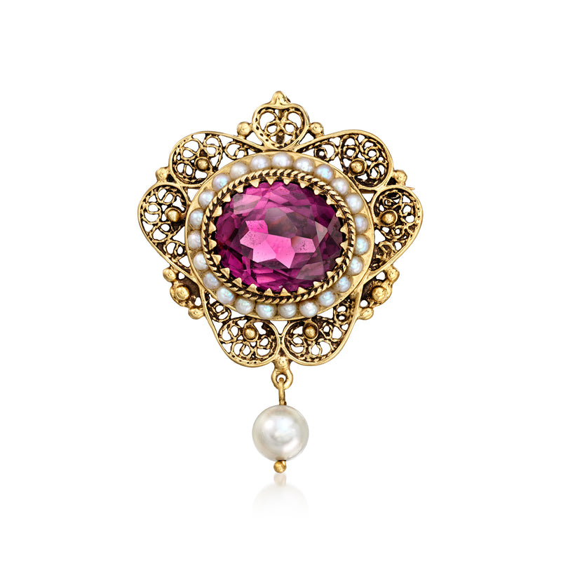 Gold pin pendant with purple center stone, pearl drop, ornate filigree setting