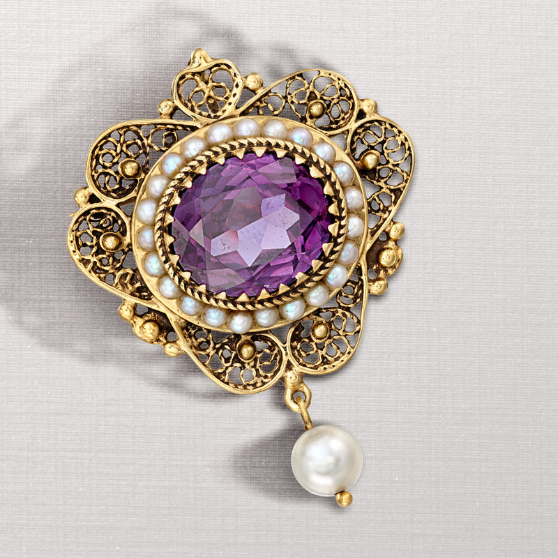 Gold pin pendant with purple oval stone, pearl drop, decorative filigree border