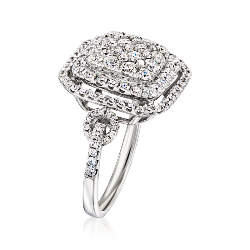 Vintage diamond cluster ring in 14kt white gold with pavé halo and split shank