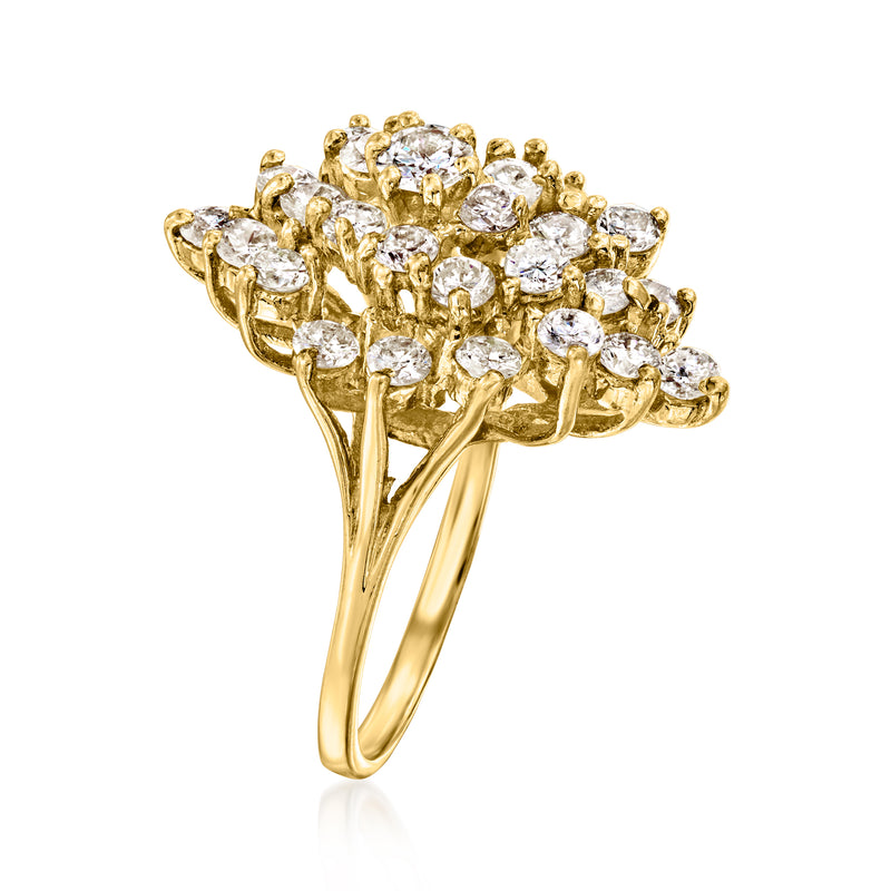 Yellow gold diamond cluster ring, side view with open band and tiered rows of stones