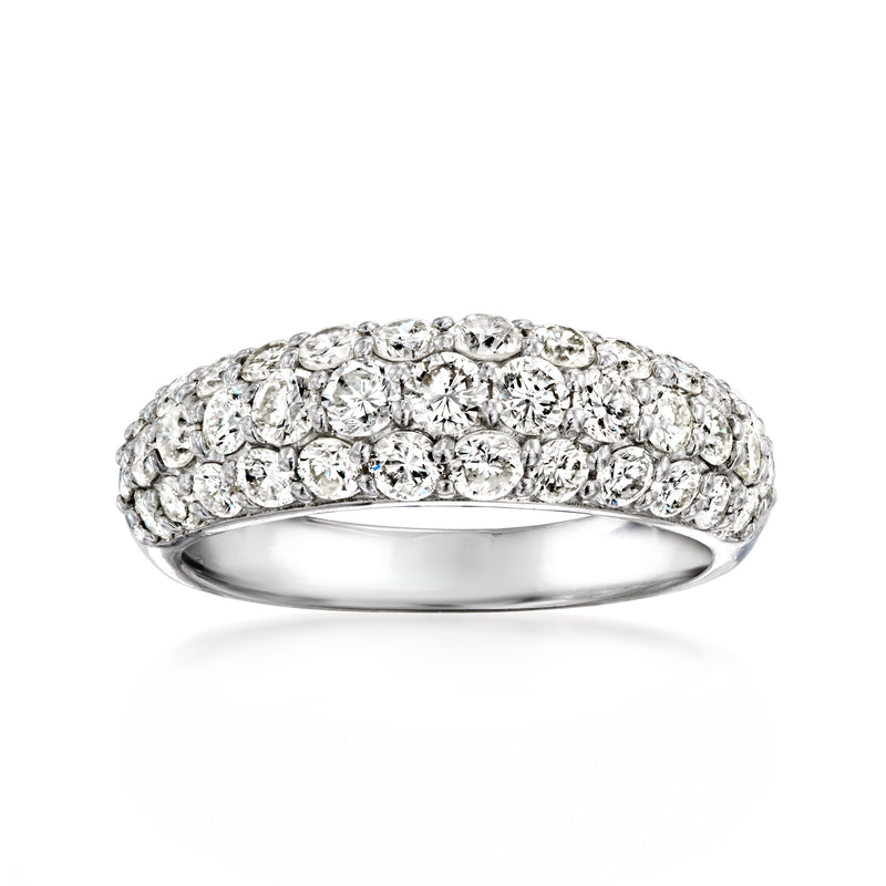 Vintage three-row diamond ring in platinum with round-cut diamonds, polished band.
