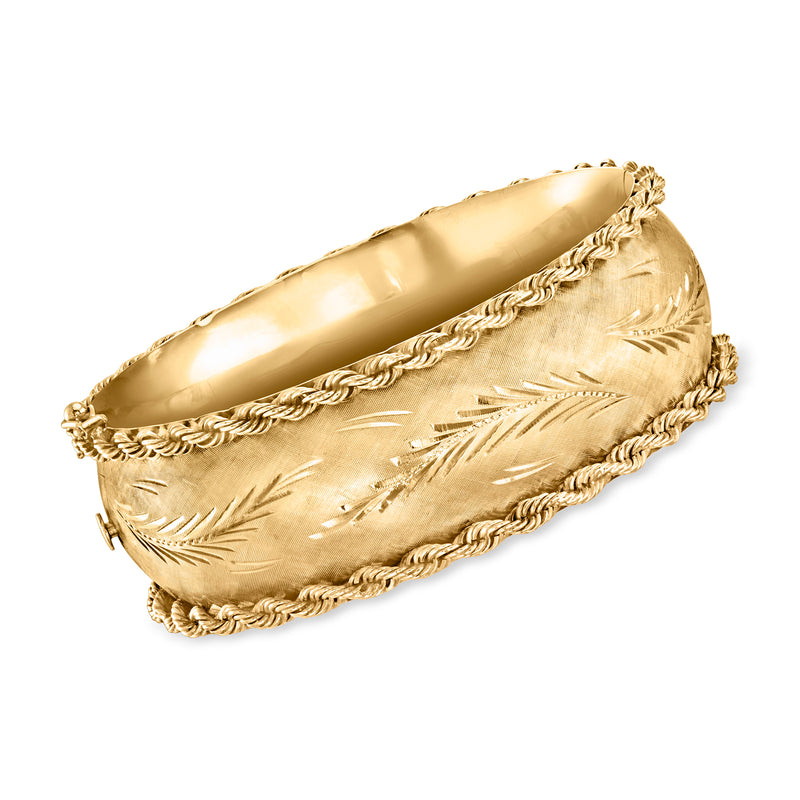 Vintage 14kt yellow gold wide bangle bracelet with etched leaf pattern and rope trim