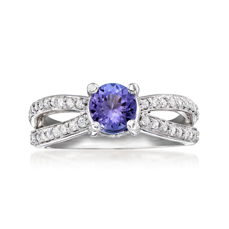 Vintage tanzanite ring with purple center stone and diamond halo, white gold