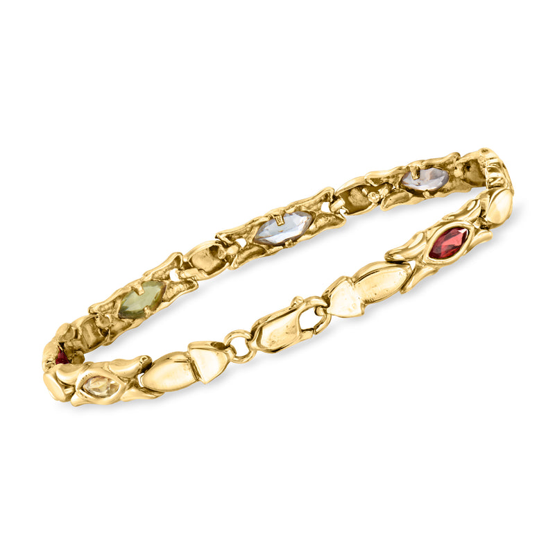 14kt yellow gold link bracelet with oval and marquise stones in clear and red
