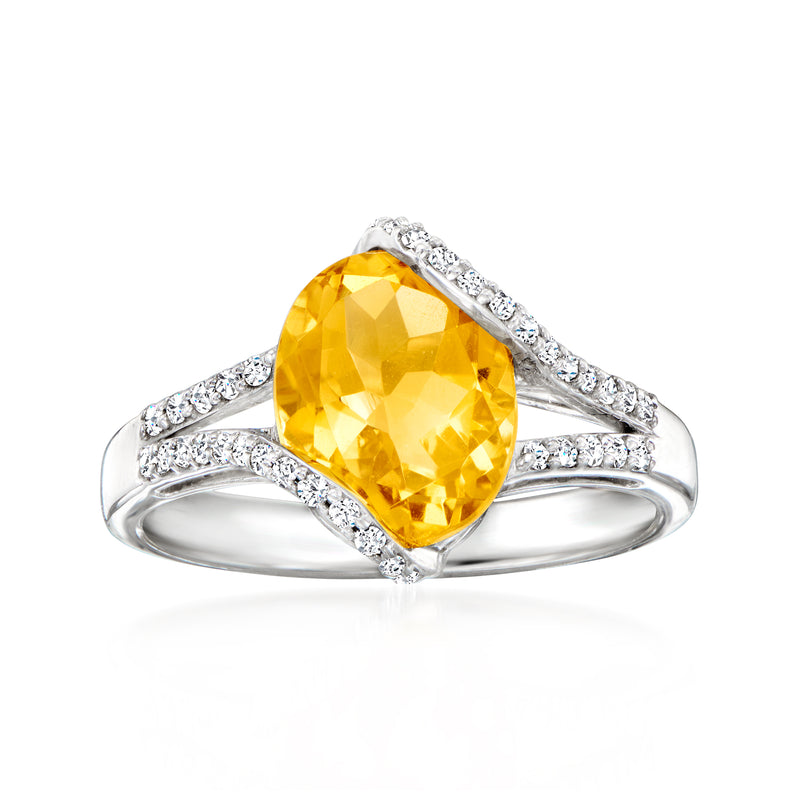 Sterling silver oval citrine ring with diamond accents, solitaire-style center