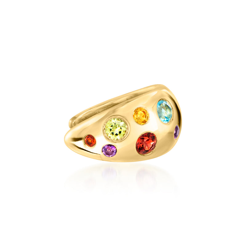 Gold-tone single ear cuff with scattered multicolor gemstones on oval band