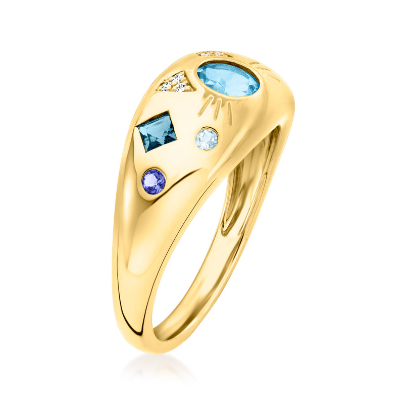Cat ring in gold with angled top, light-blue oval center, blue and clear round stones