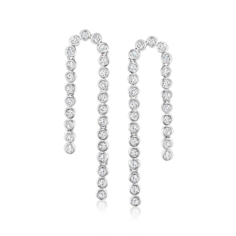 Sterling silver diamond drop earrings with round bezel-set stones, long vertical design