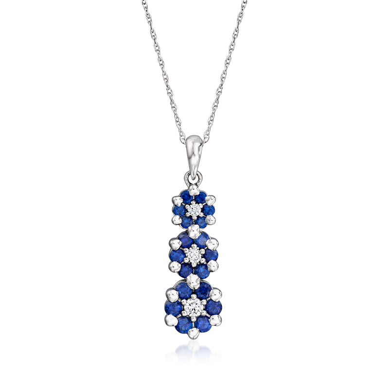 Blue sapphire cluster pendant necklace in white gold