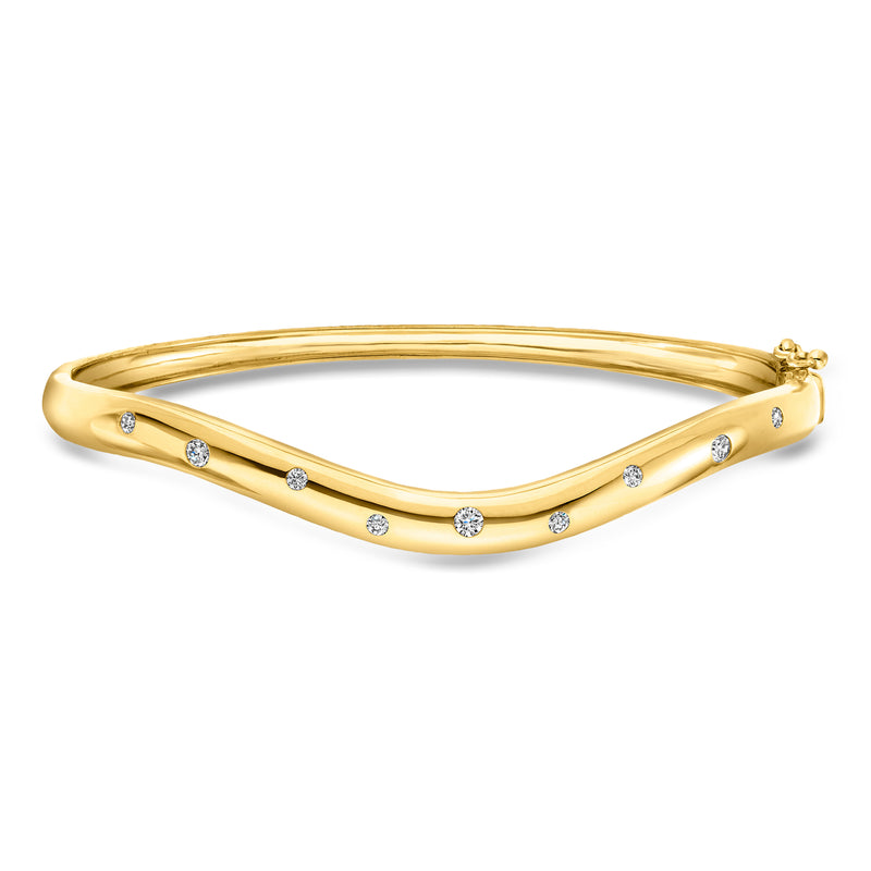Curved gold bangle bracelet with round lab-grown diamond accents, hinged clasp