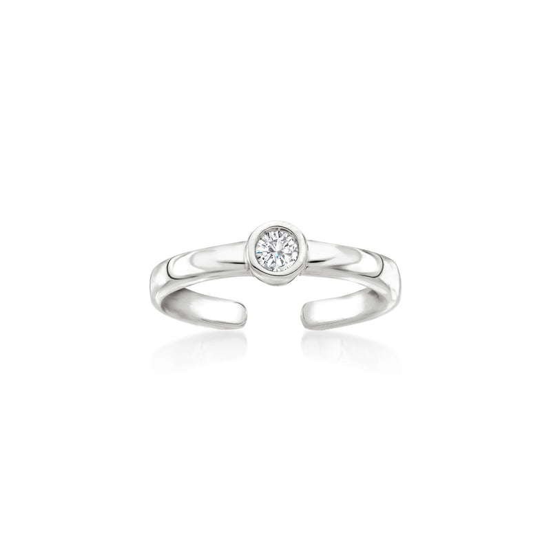 Sterling silver bezel-set diamond toe ring with round center stone, curved band