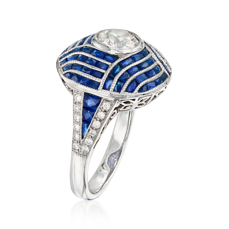Vintage 18kt white gold ring with oval diamond, sapphire stripes, and pavé accents