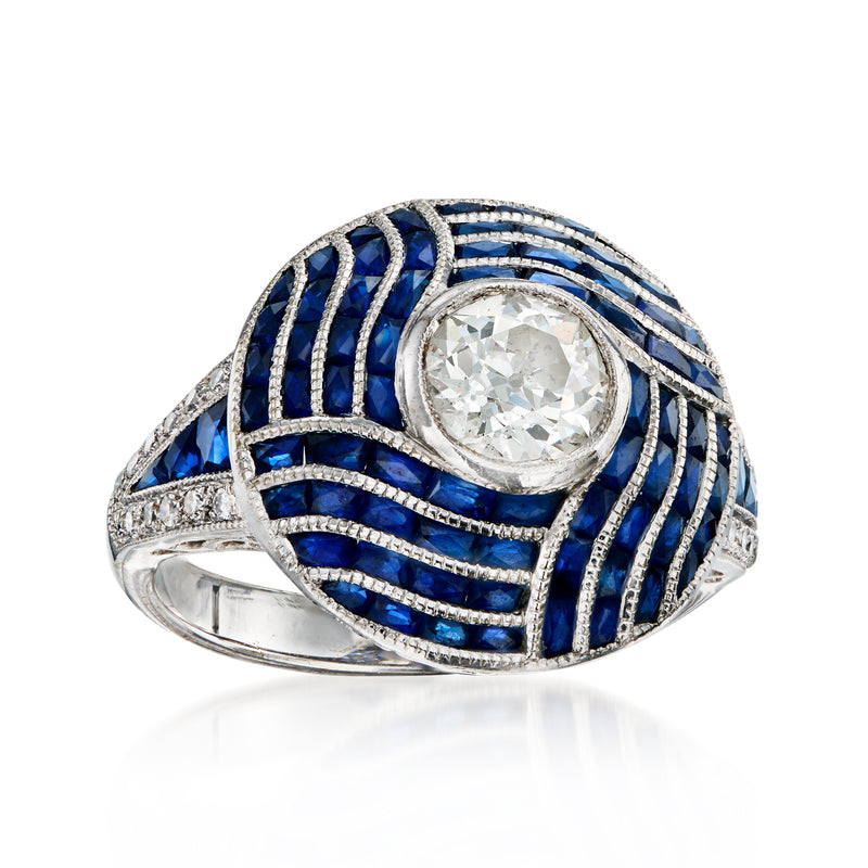 Vintage sapphire and diamond ring in 18kt white gold, round center stone and wave setting