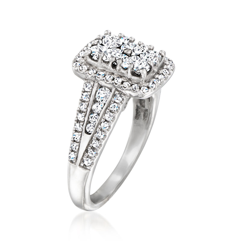 Vintage 14kt white gold diamond cluster ring with pavé shoulders