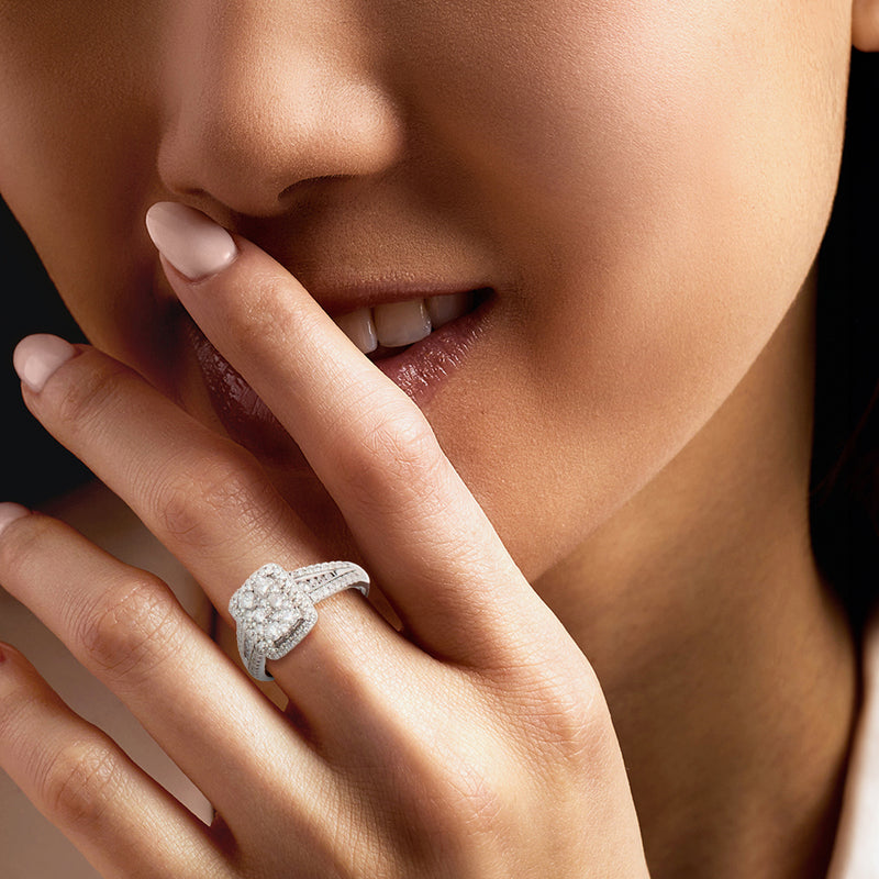 Diamond cluster ring in white gold on a woman's hand
