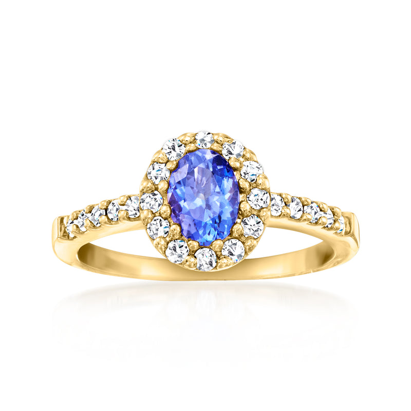 Vintage oval tanzanite and diamond halo ring in 14kt yellow gold