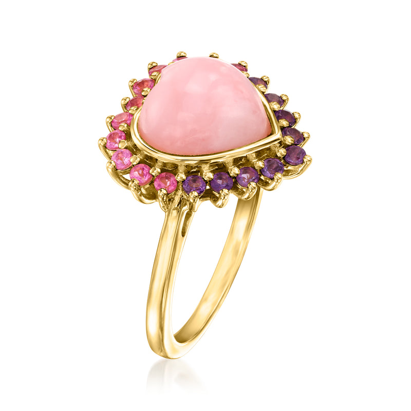 Gold heart ring with pink center stone and pink and purple halo stones around the band