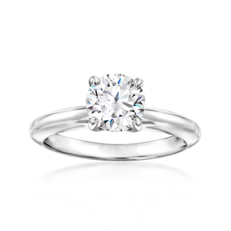 White gold solitaire diamond ring with round center stone, 4-prong setting