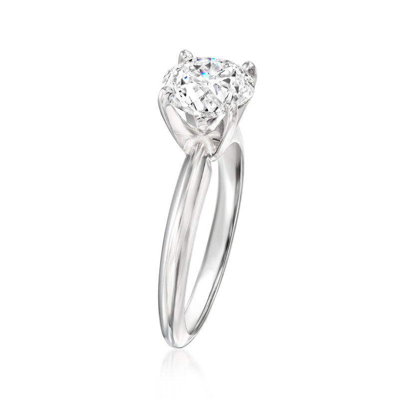 14kt white gold solitaire diamond ring with round center stone, side view