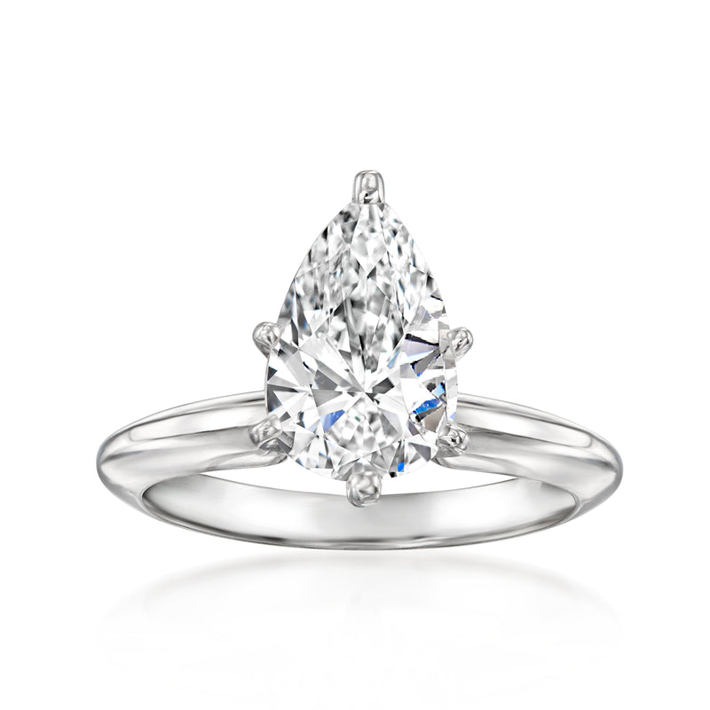 14kt white gold solitaire ring with pear-shaped diamond center, four-prong setting