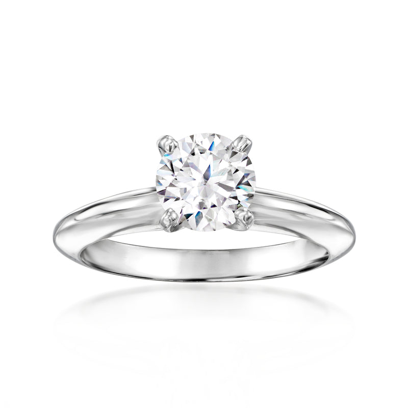 14kt white gold diamond solitaire ring with round center stone, four-prong setting