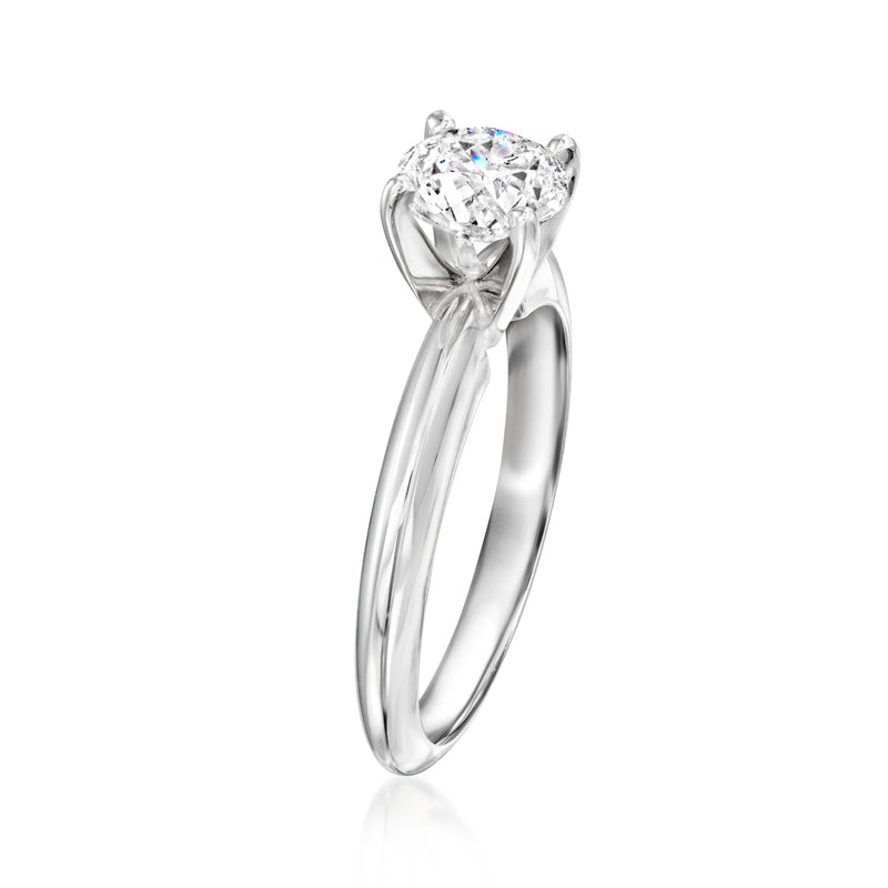 14kt white gold diamond solitaire ring, round diamond in four-prong setting