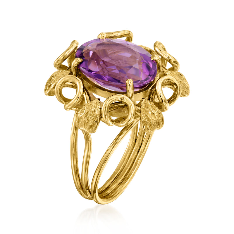 Oval amethyst ring in 18kt yellow gold with curled filigree band