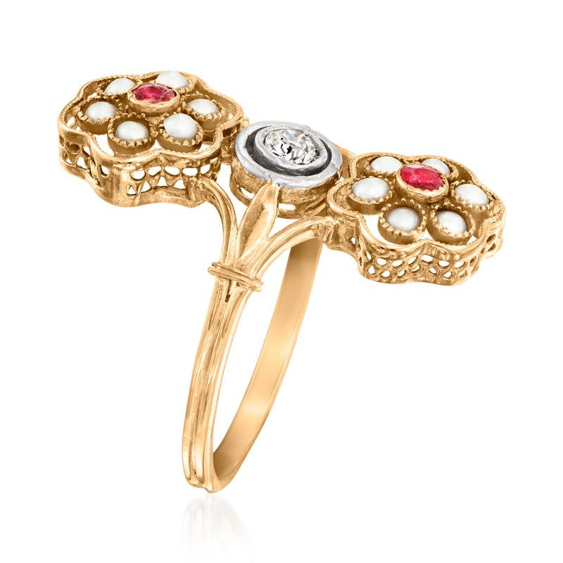 Vintage yellow gold flower ring with ruby, white pearls, and round diamond in center