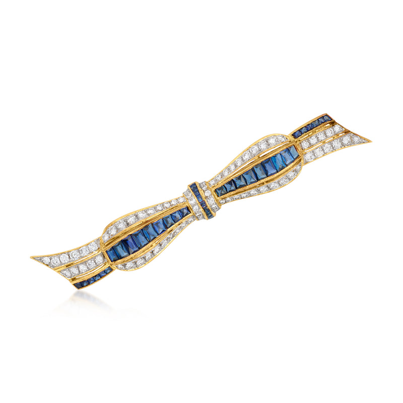 Vintage sapphire and diamond bow pin in 18kt yellow gold, blue stones and clear diamonds