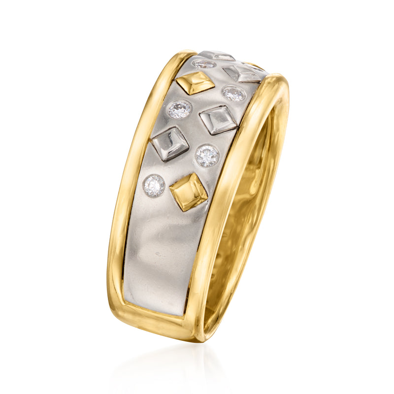 Side view of vintage diamond ring with platinum center and yellow gold geometric settings.