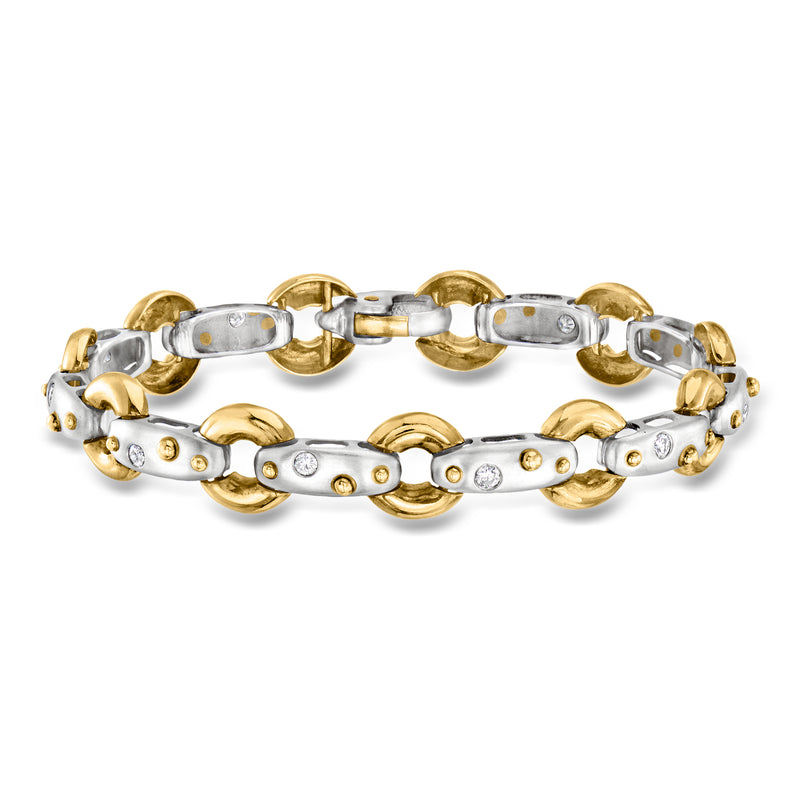 Platinum and 18k yellow gold diamond link bracelet with oval bezel-set accents