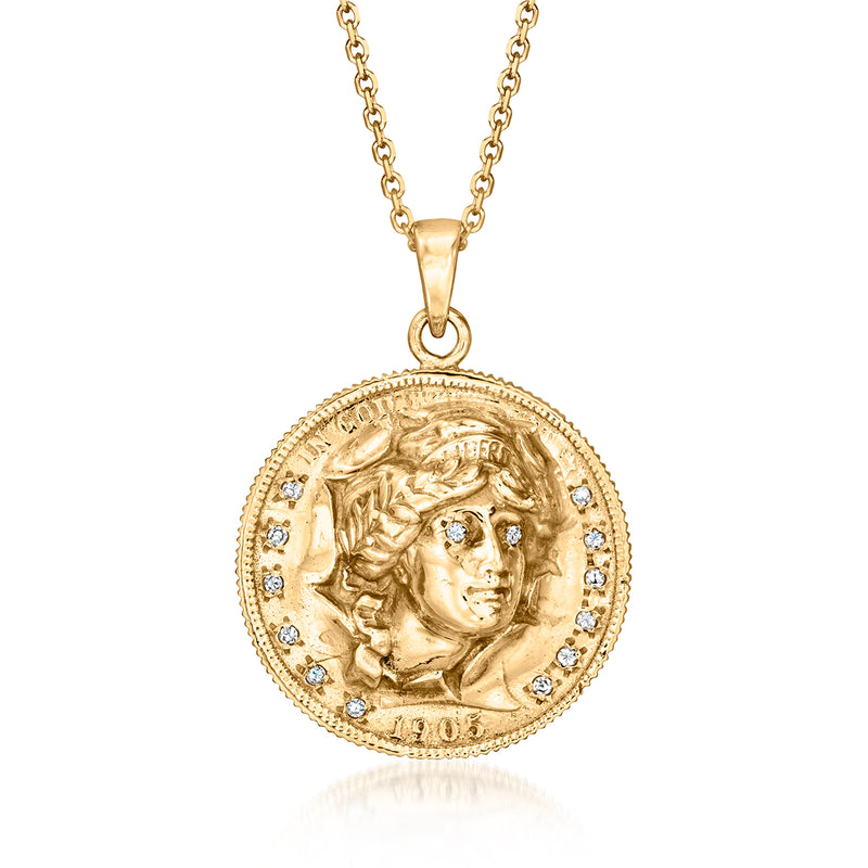 14kt yellow gold coin-style pendant with engraved Liberty head profile and small accents