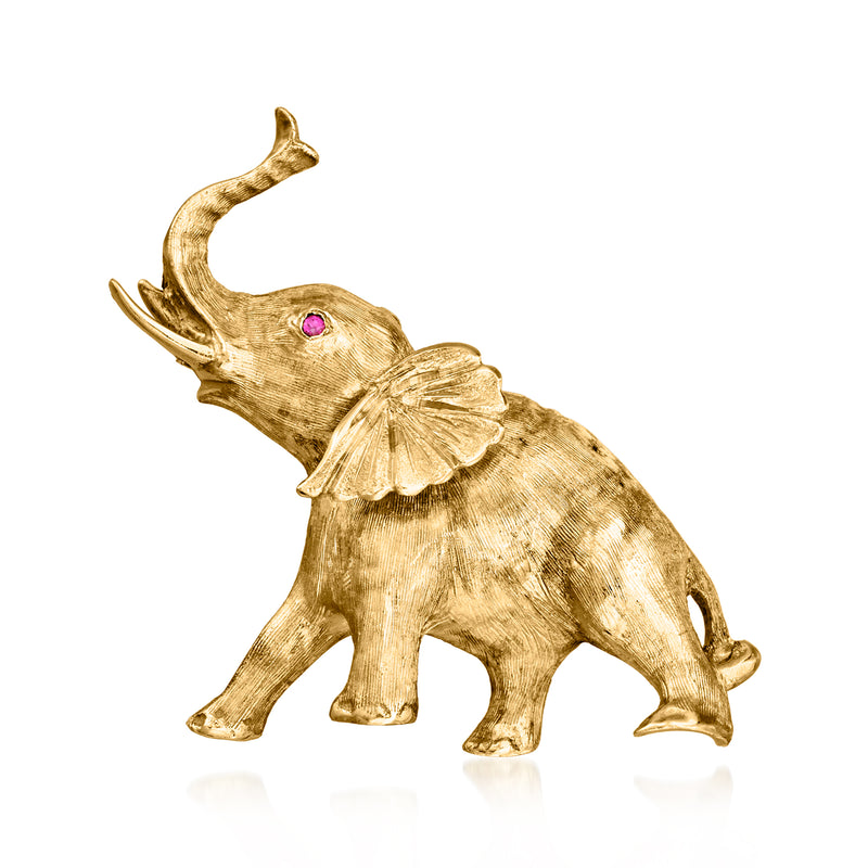 Vintage 14kt yellow gold elephant pin with one round ruby on the head