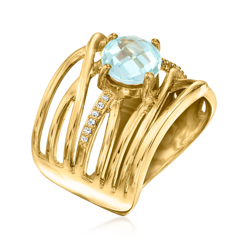 Gold side view crisscross ring with prong-set oval sky-blue gemstone and diamond row