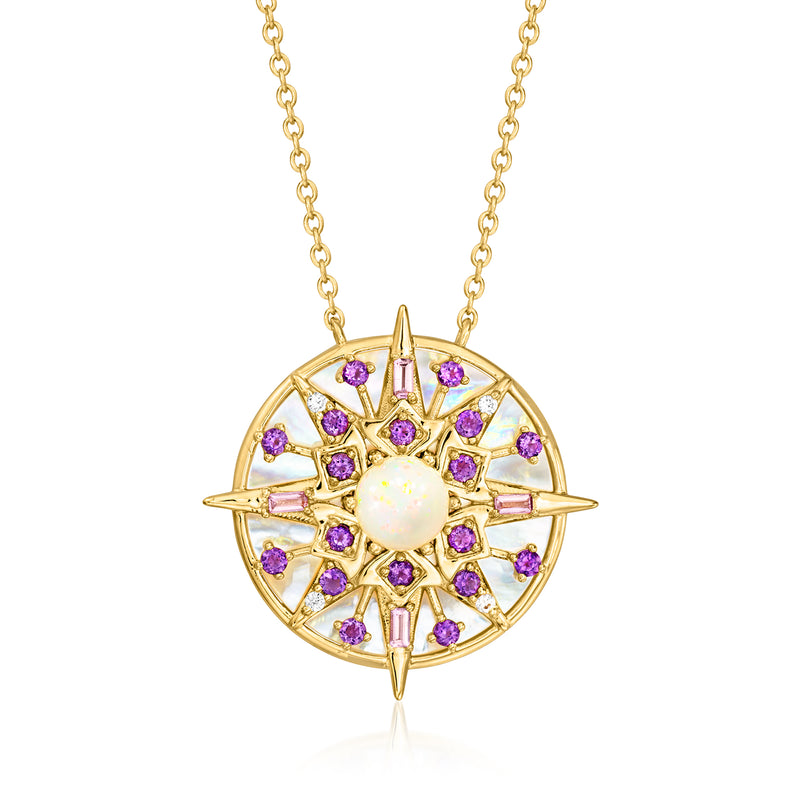 Gold compass pendant necklace with opal center and purple gemstones, linked chain