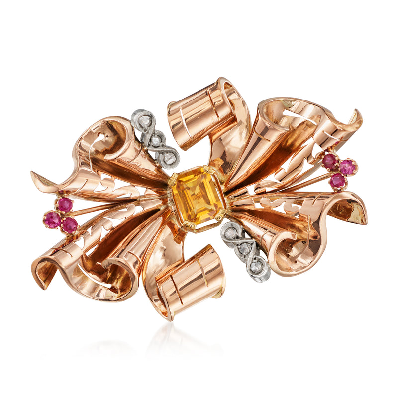 Vintage rose gold bow pin with citrine center, ruby accents, diamond details