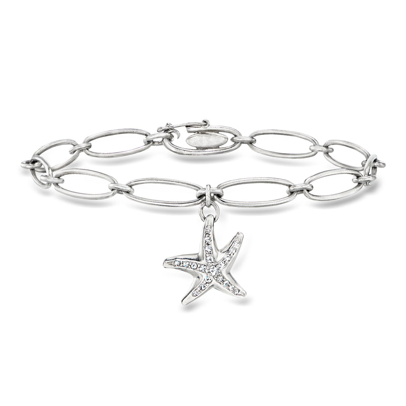 Platinum starfish charm bracelet with diamond-like accents on linked oval chain