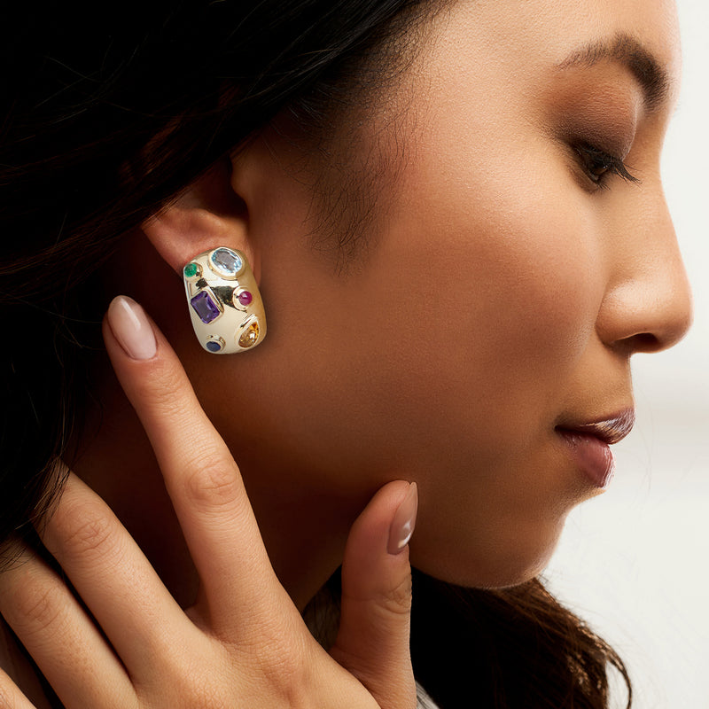 Multicolor gemstone curved earrings in 14kt yellow gold worn on ear