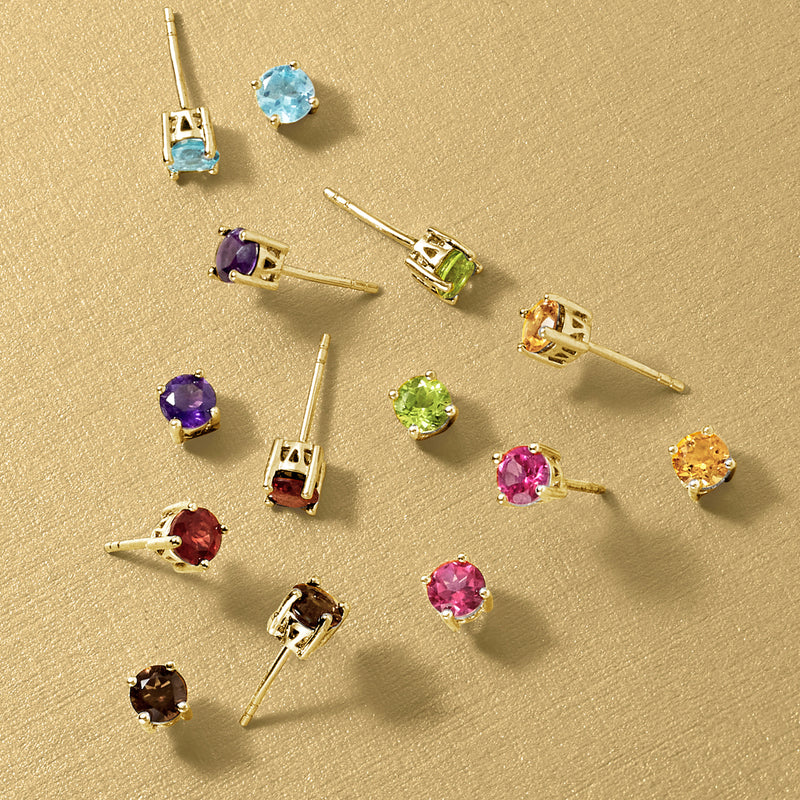 Assorted round gemstone stud earrings with gold-tone posts: blue, purple, green, red, pink
