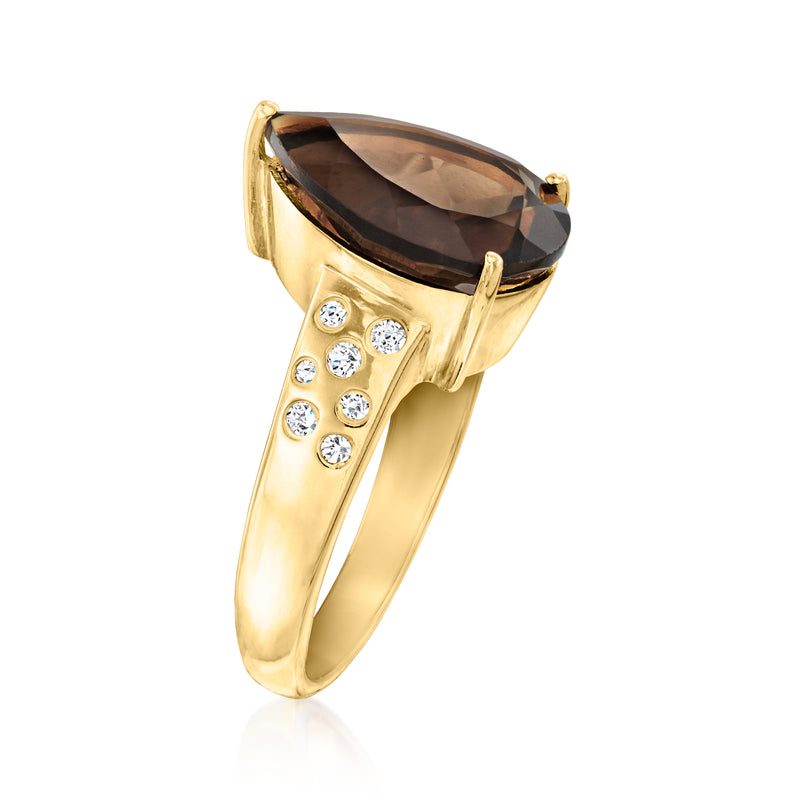 18kt gold over sterling ring with smoky quartz oval center and white zircon side clusters