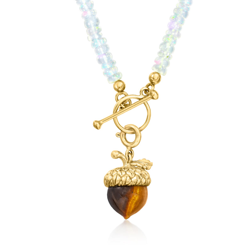 Tiger eye acorn charm with gold loop and clasp, side view