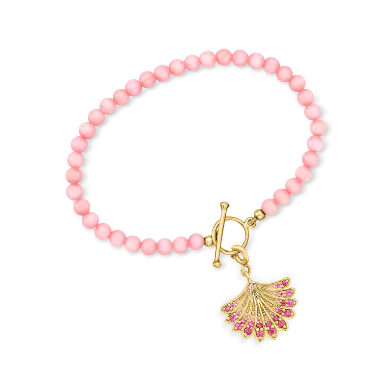Pink coral bead toggle bracelet with gold clasp and flower fan charm