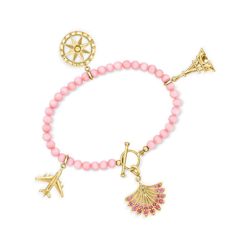 Pink coral bead toggle bracelet with gold clasp, compass and trumpet charms, fan pendant