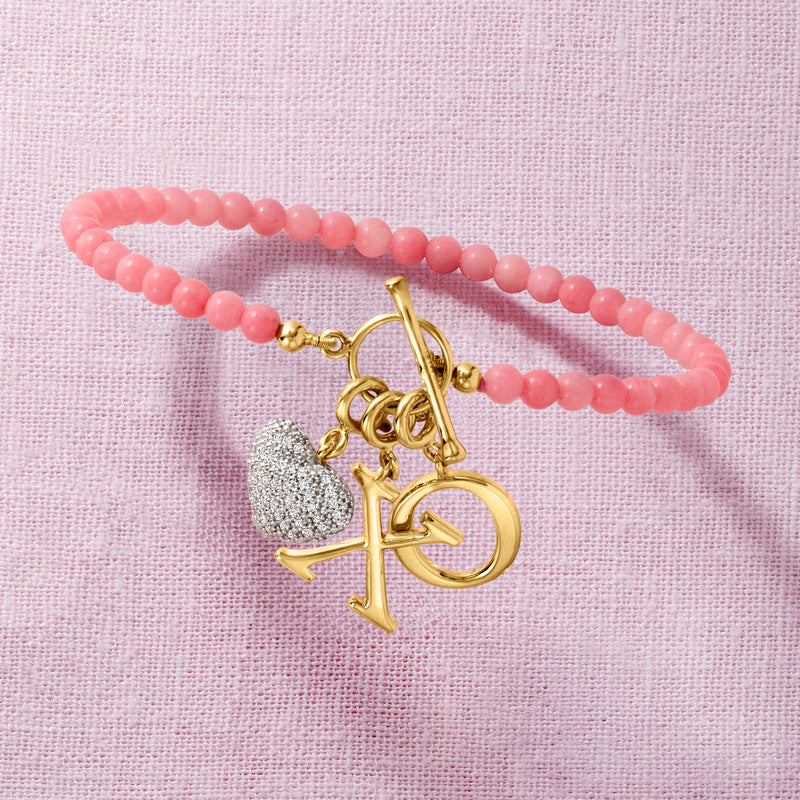 Pink coral bead toggle bracelet with gold clasp and large anchor charm