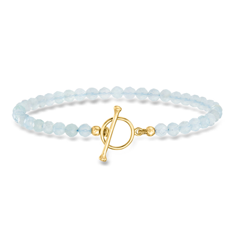 Aquamarine bead toggle bracelet with gold clasp and charm